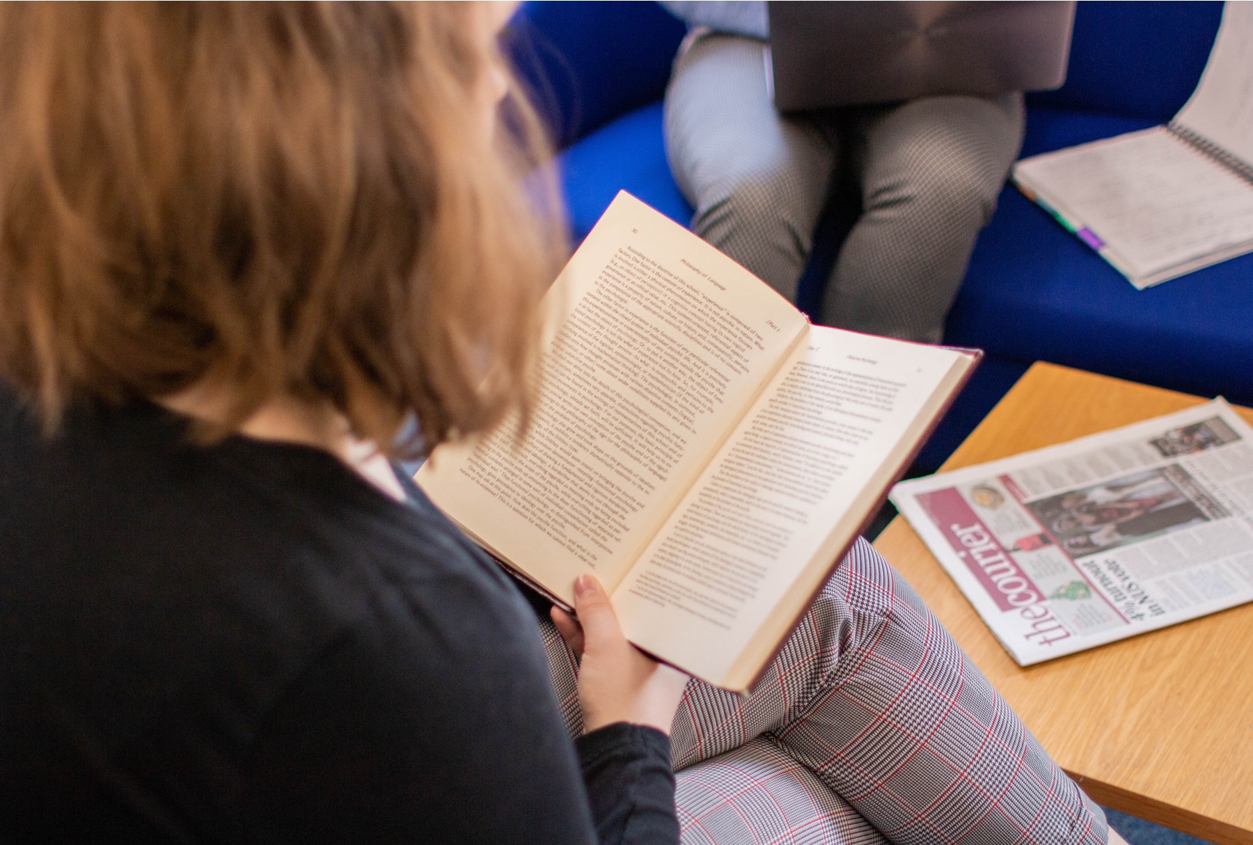 Student reading a book